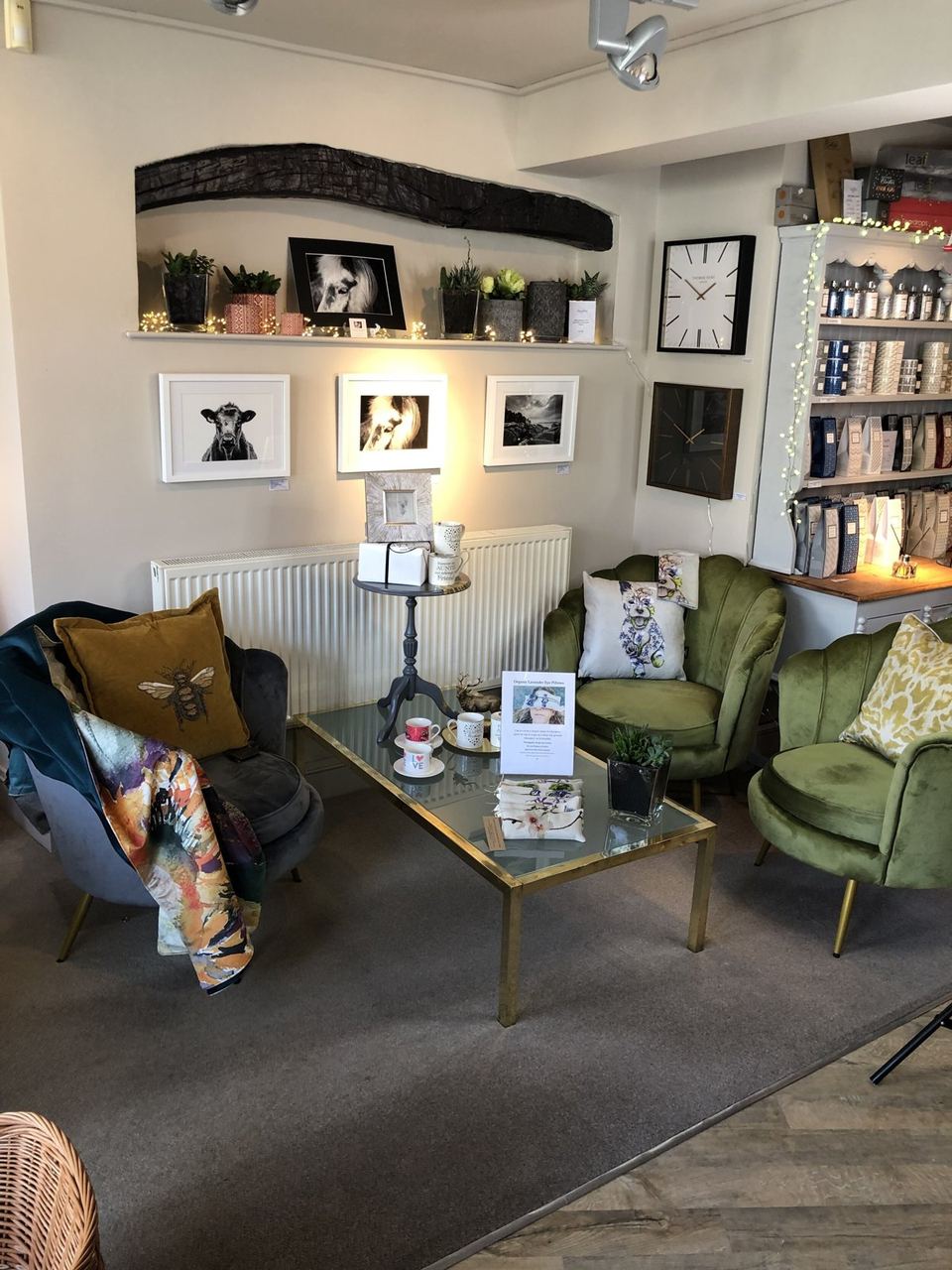Soft chairs and a small café table at 4 You From Me