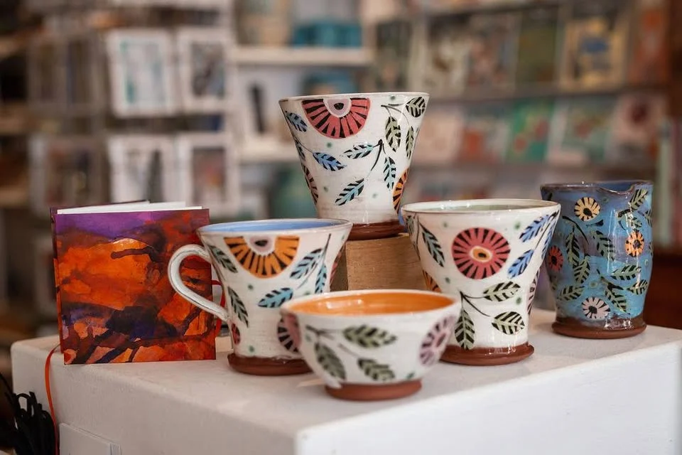 Patterned ceramic mugs displayed at Artworks South Brent