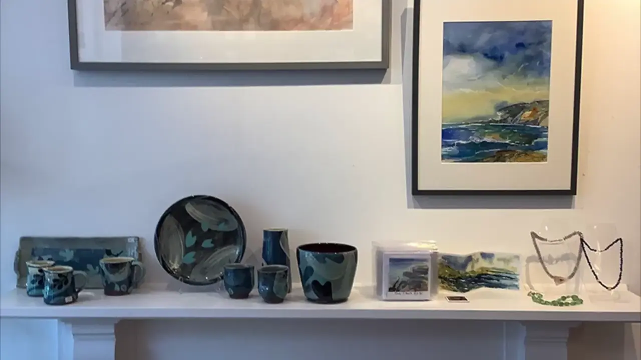 Paintings and decorative ceramics displayed together at Artworks