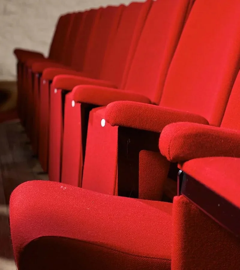 A close view of the Barn Cinema’s red seats