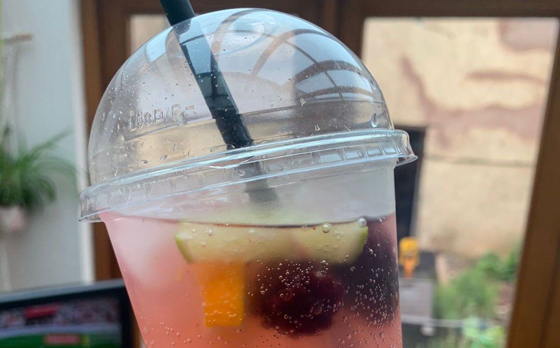 A cold fruit drink served in the courtyard