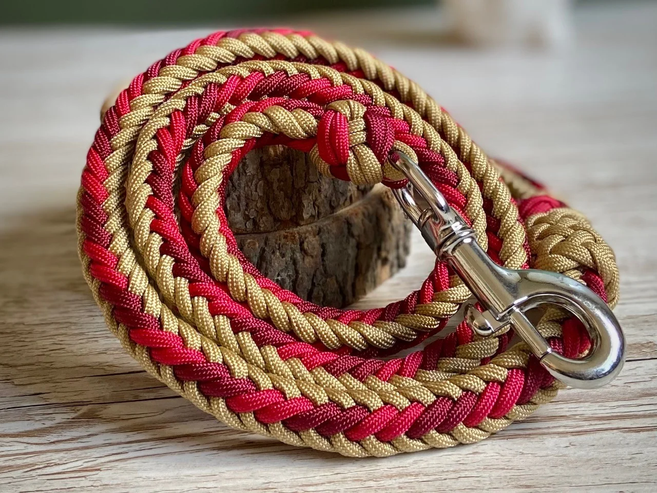 A red and gold braided dog lead by Big Green Hound