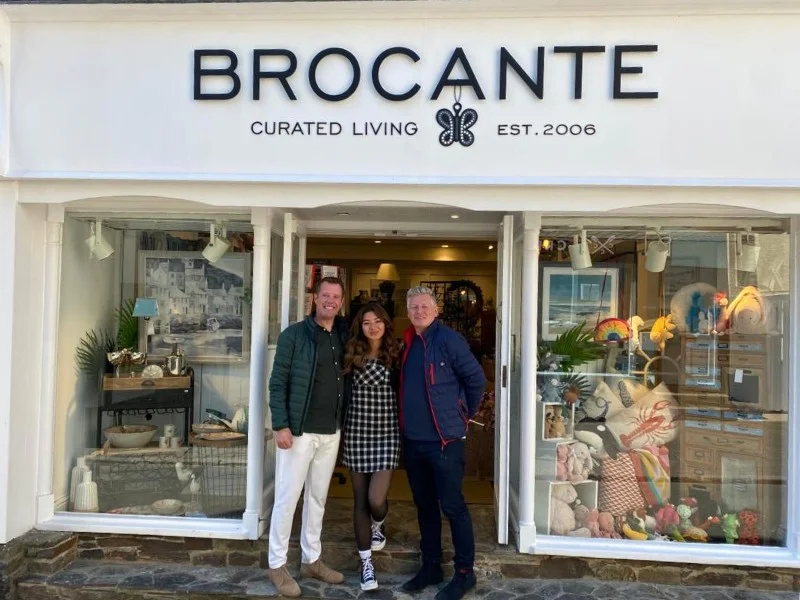 Brocante Salcombe shopfront with staff at the doorway