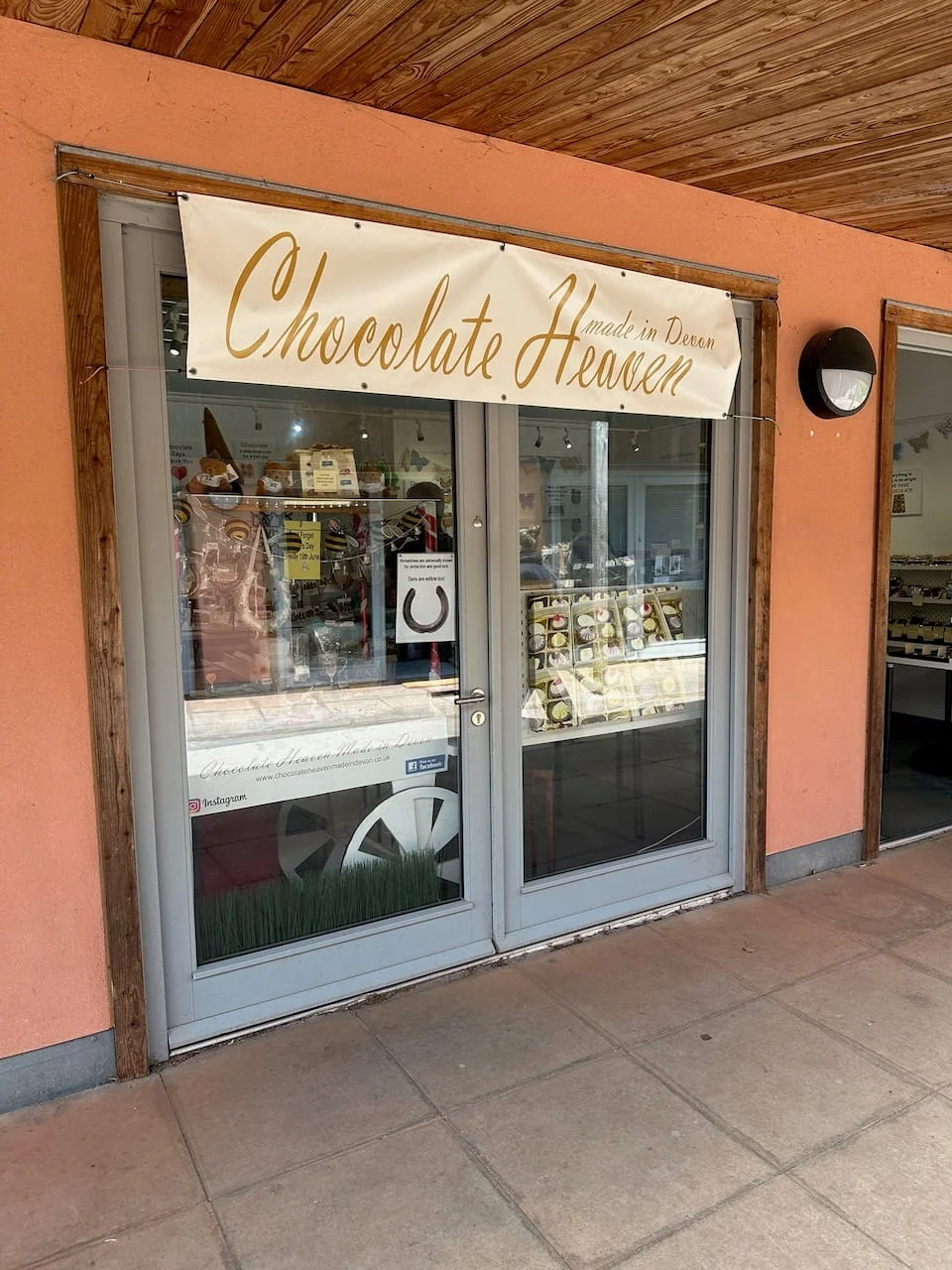Chocolate Heaven’s glazed shop entrance at Cockington