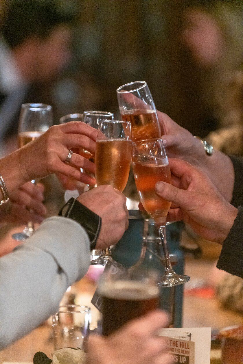 Guests raising glasses together at Coldharbour