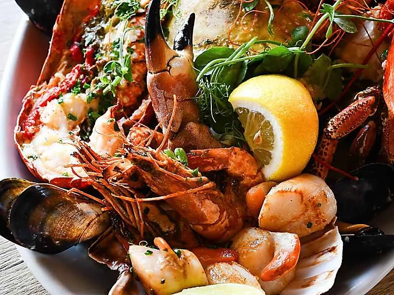A platter of lobster, prawns, scallops and mussels
