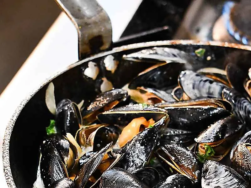 Mussels in a pan at Crab Shed Salcombe