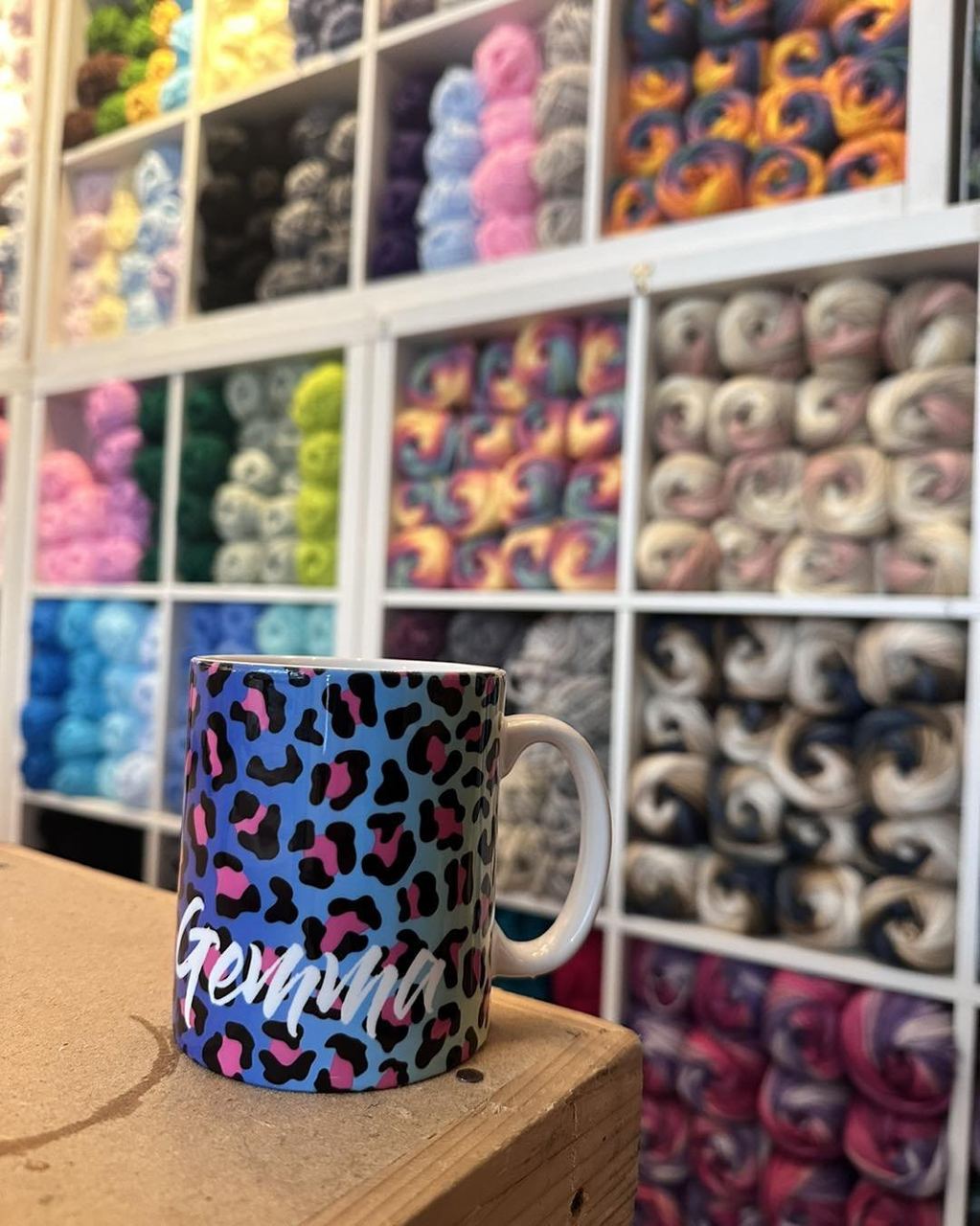 Shelves of brightly coloured yarn