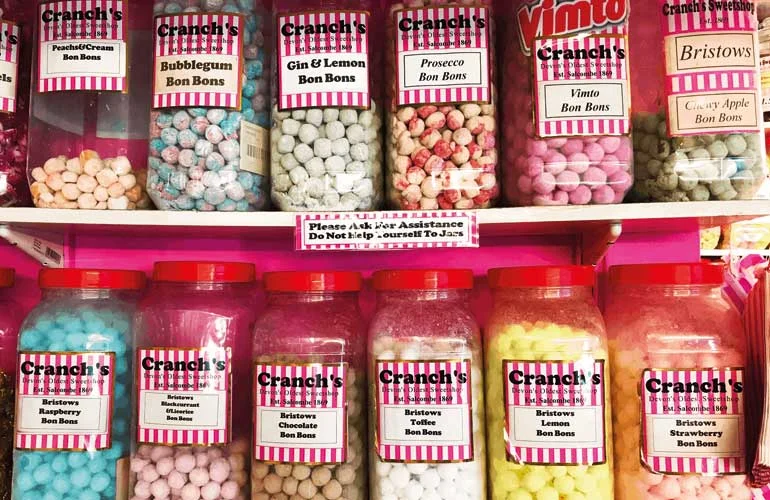 Shelves of striped Cranch’s jars holding traditional sweets
