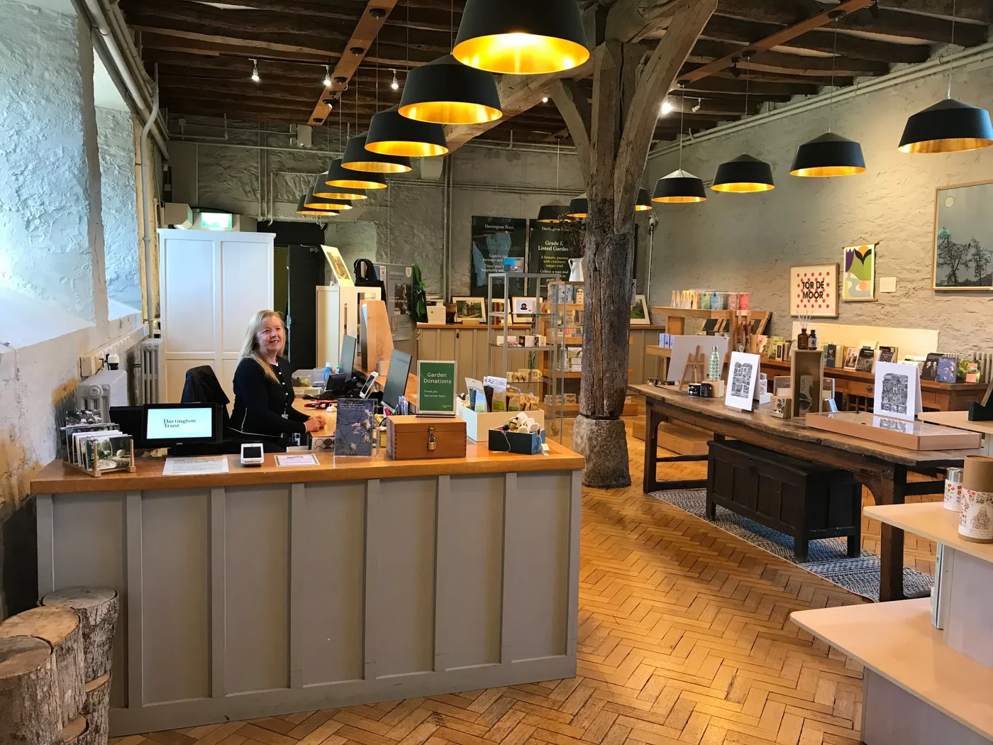 Books, prints and gifts inside the Welcome Centre Shop at Dartington Hall