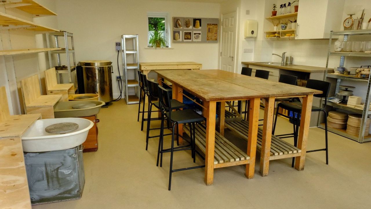 Pottery wheels, worktables and shelves in the Dartmoor Makers studio