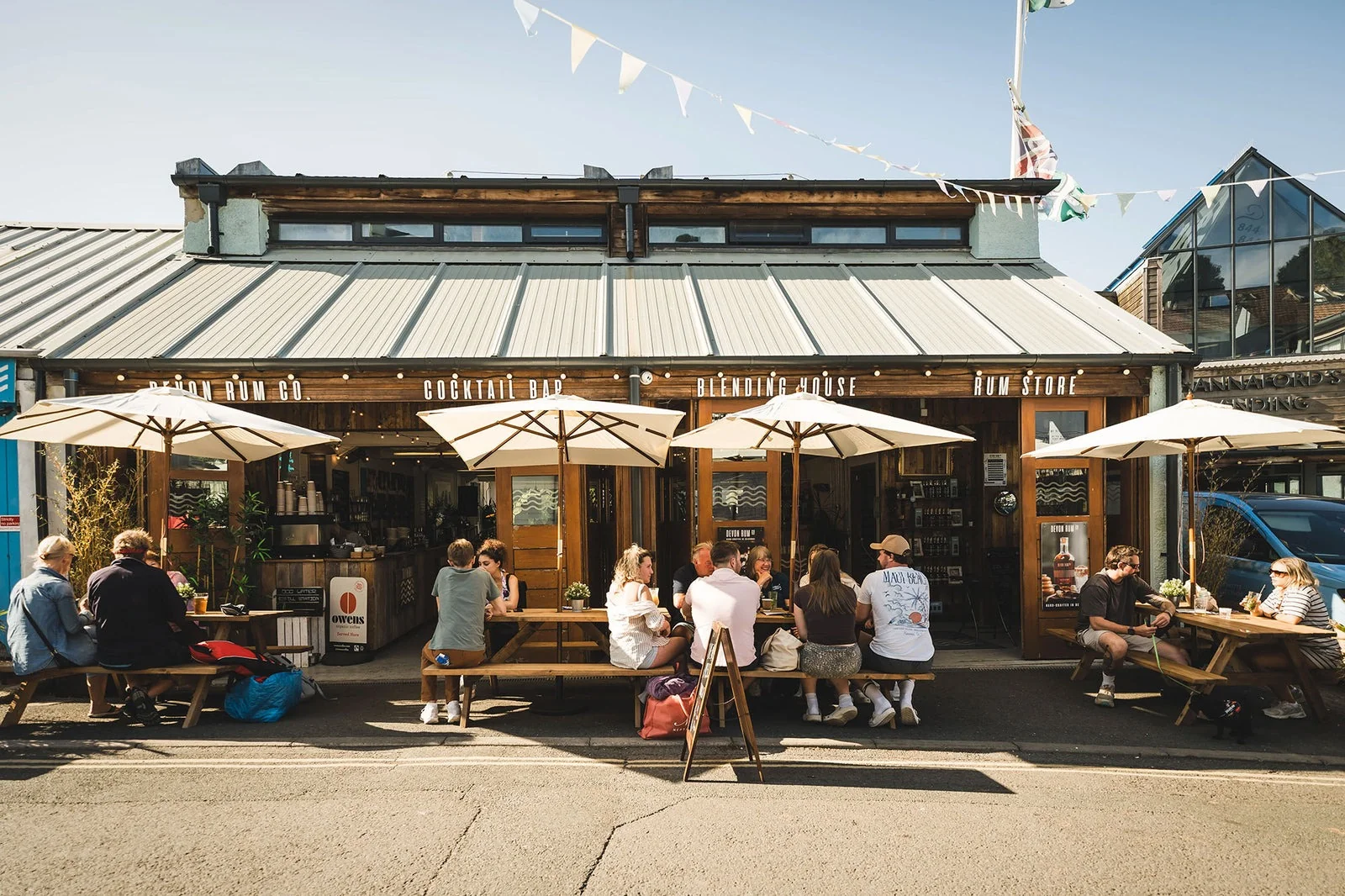 Devon Rum Bar frontage with outdoor tables on Island Street