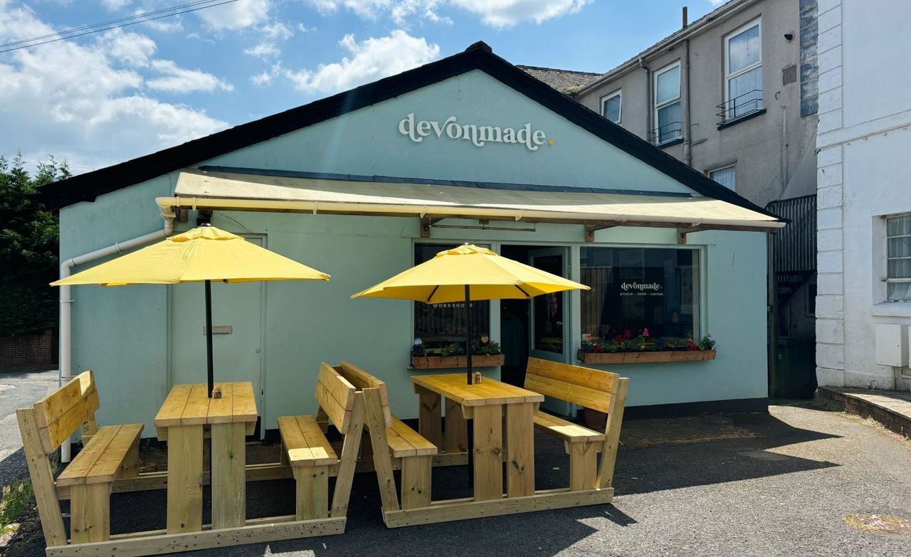 Yellow parasols outside Devonmade in Preston