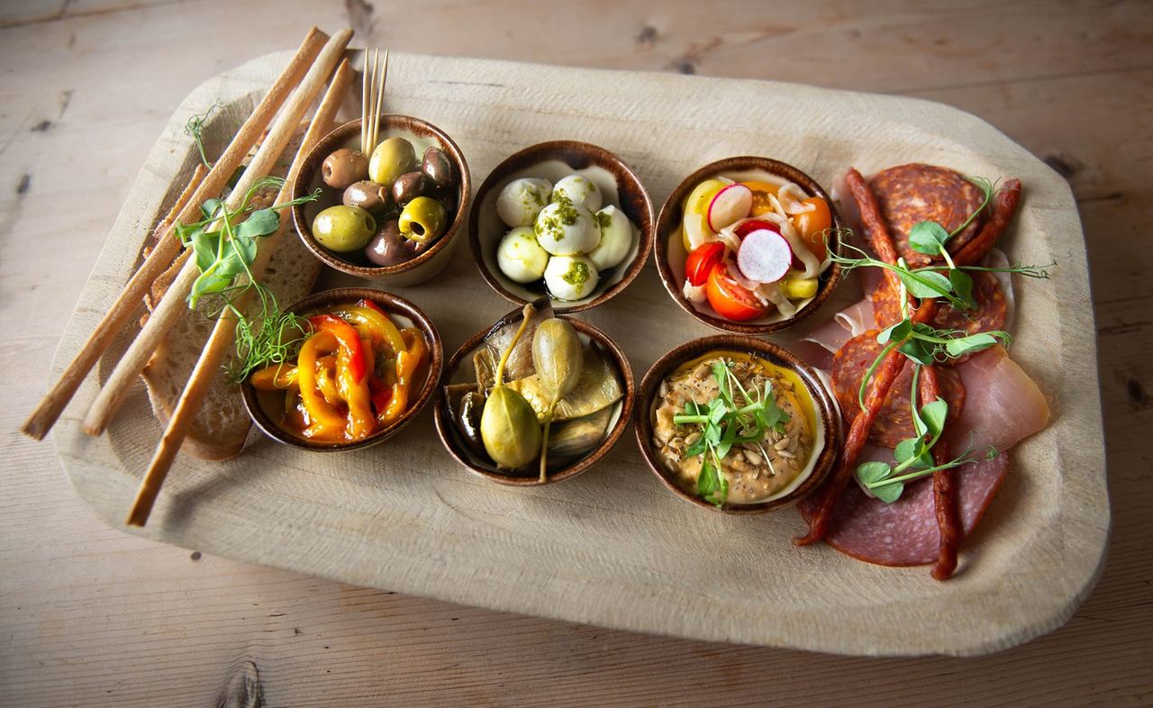 A platter of olives, vegetables and nibbles at The Duck