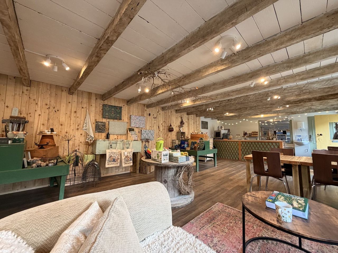 The light-filled café and gift shop inside the garden buildings
