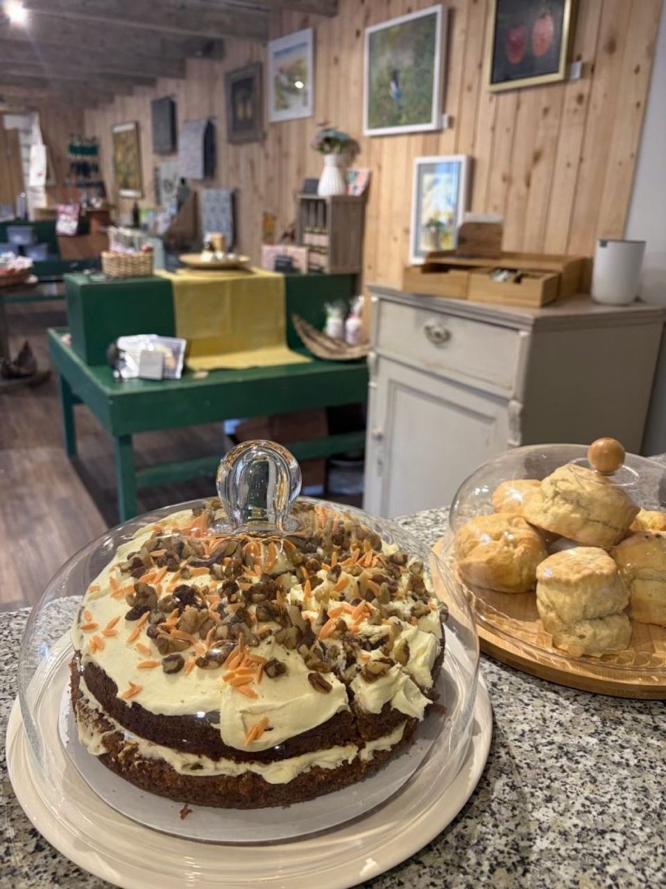 Cakes displayed on the café counter