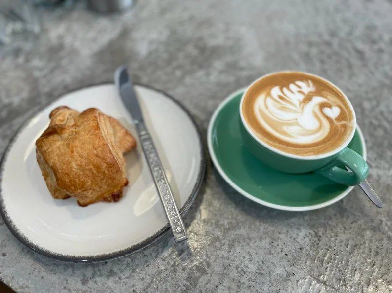 Coffee and a homemade bake on a table