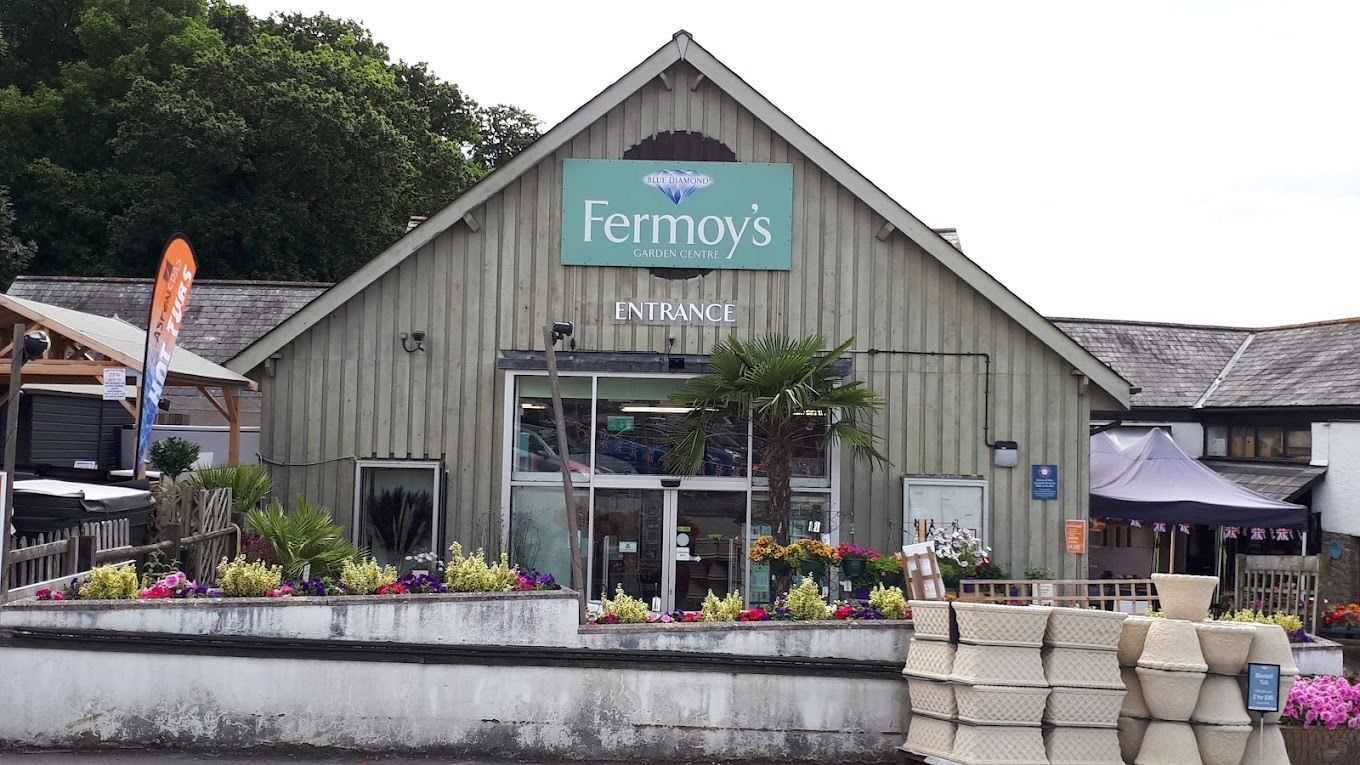 Timber-clad entrance to Fermoy’s Garden Centre with flowers outside