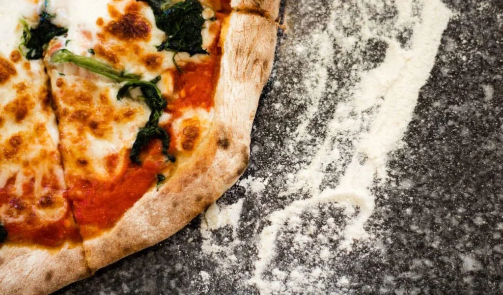 A wood-fired pizza pictured on Bantham Estate’s Gastropizza listing