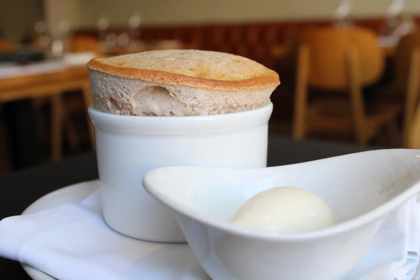 A golden soufflé served at Gather