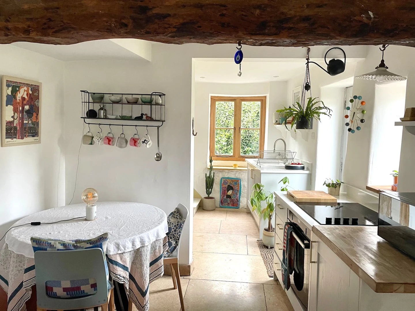 Kitchen beneath an exposed wooden beam