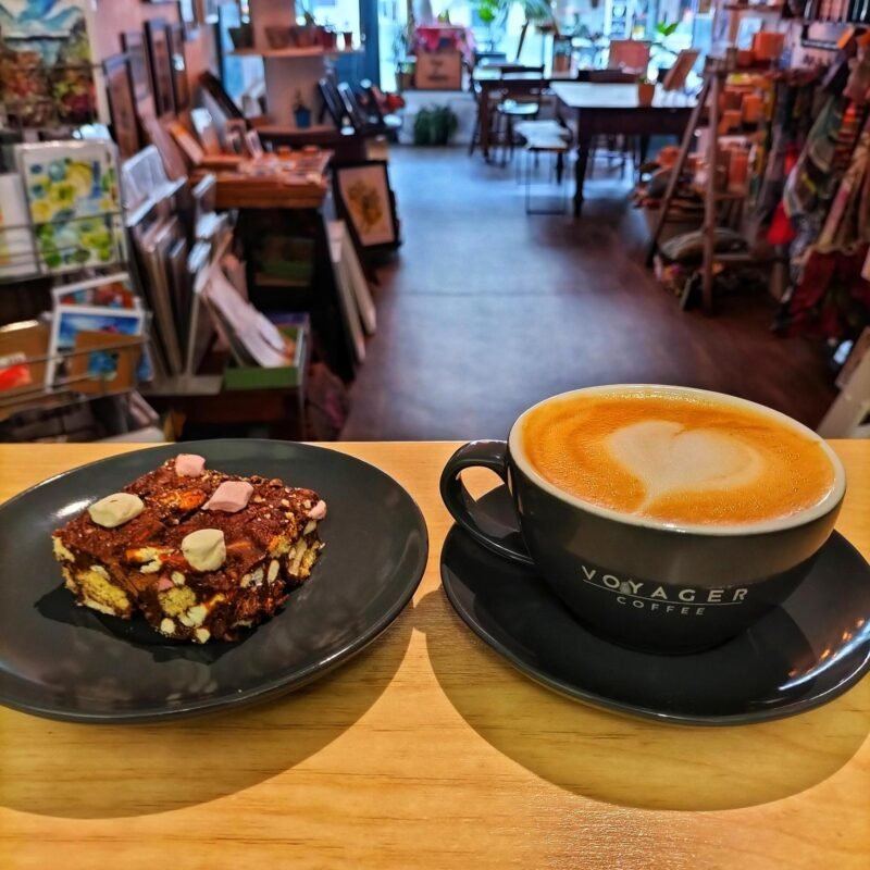 Coffee and cake with the gallery beyond