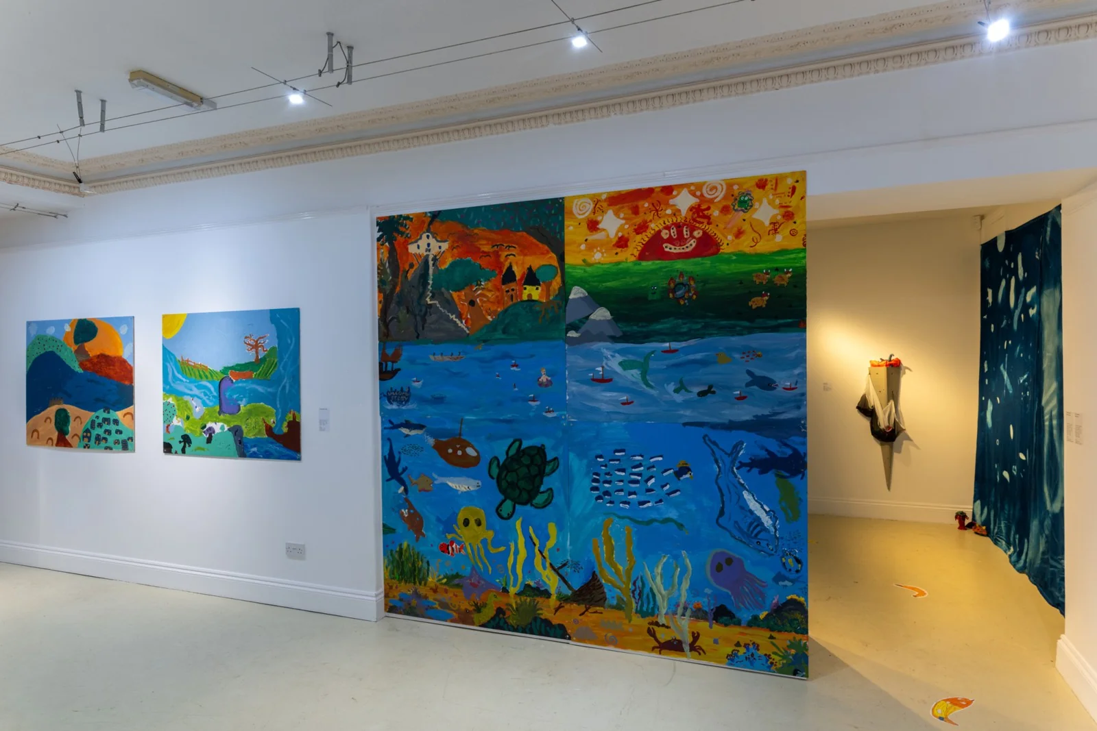 Colourful artworks installed in Harbour House’s gallery