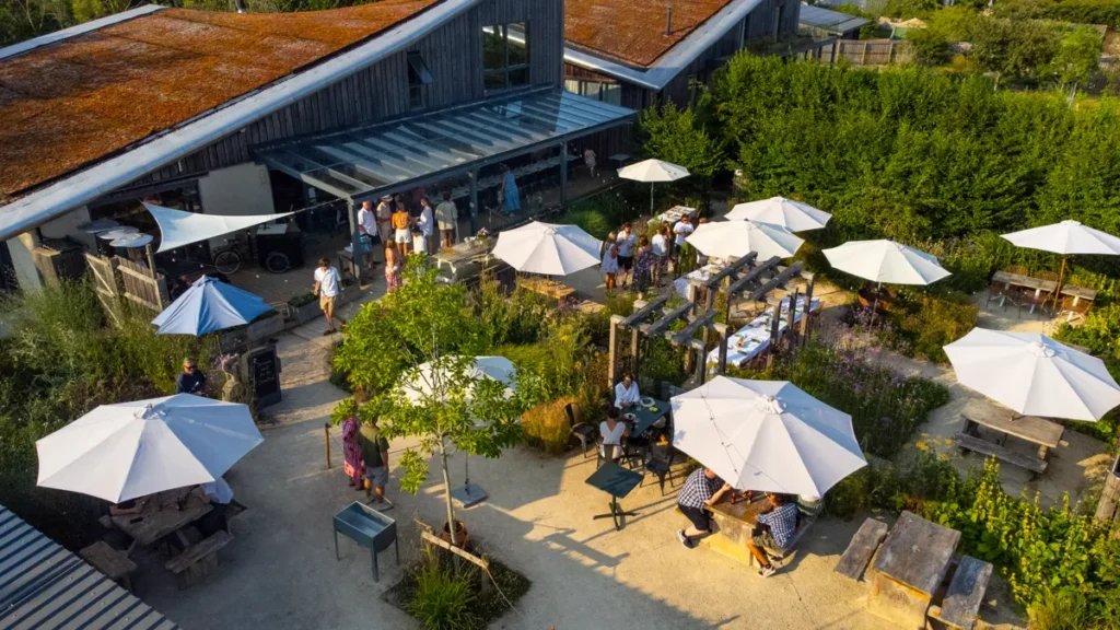 Aerial view of Heron Farm’s restaurant terrace and garden tables