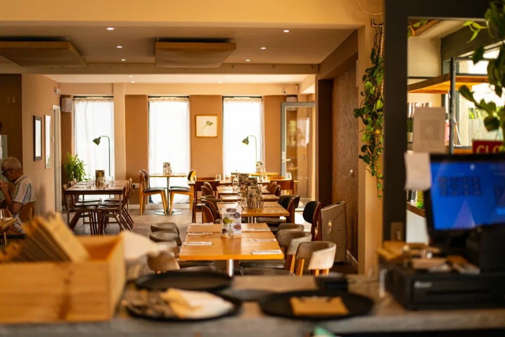 Warmly lit restaurant interior at Heron Farm