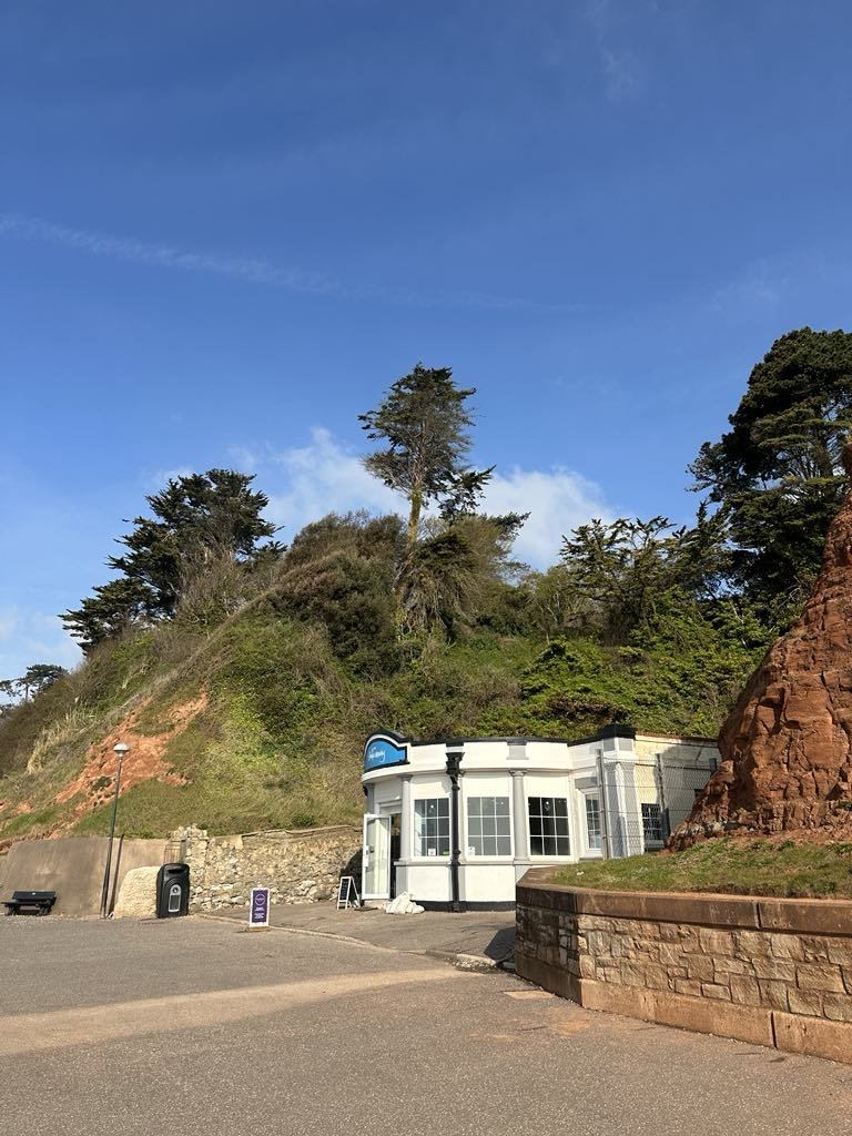 The small Hideaway café at the foot of the Seaton cliff
