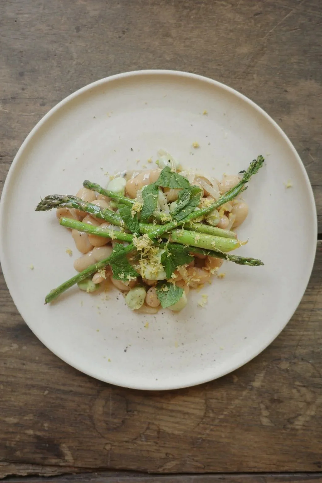 An asparagus dish photographed at Inba
