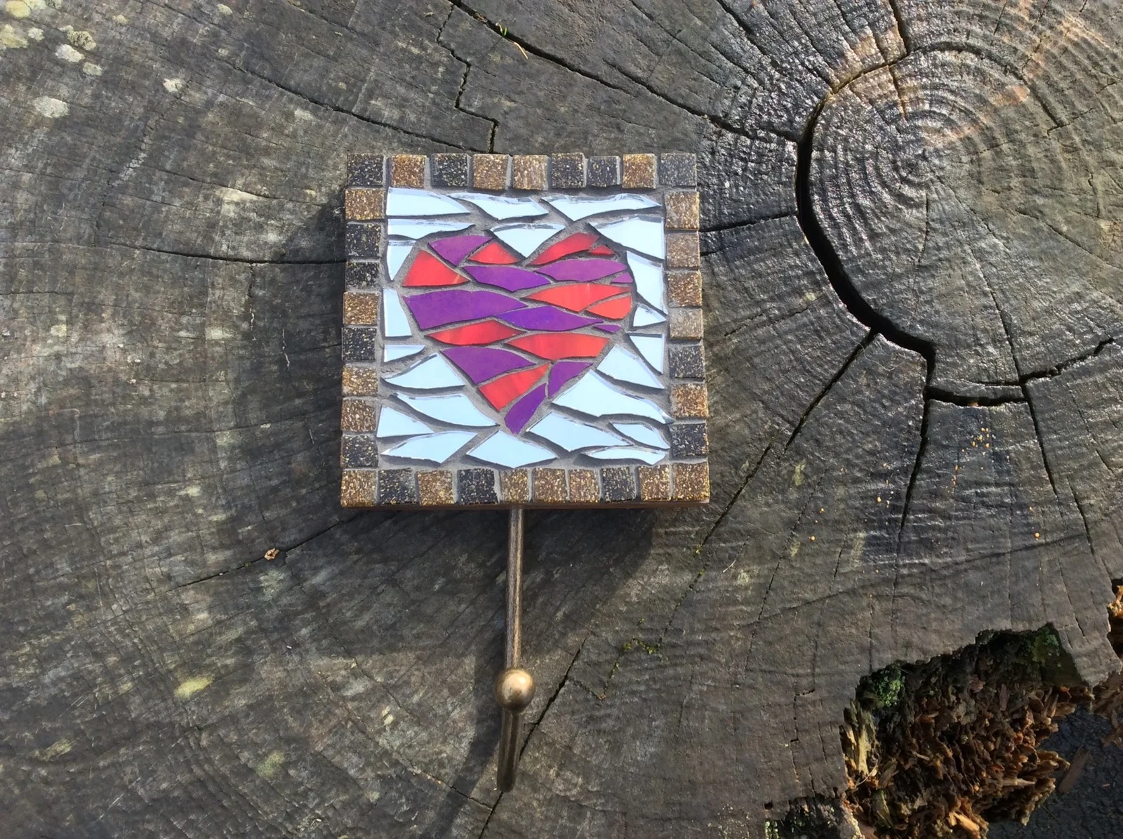 Small square mosaic with a red heart