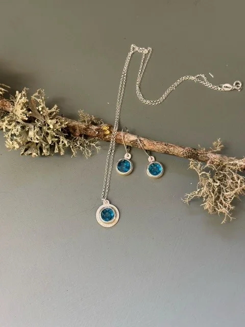 Handmade pendant and earrings from Jo Bradford’s jewellery collection