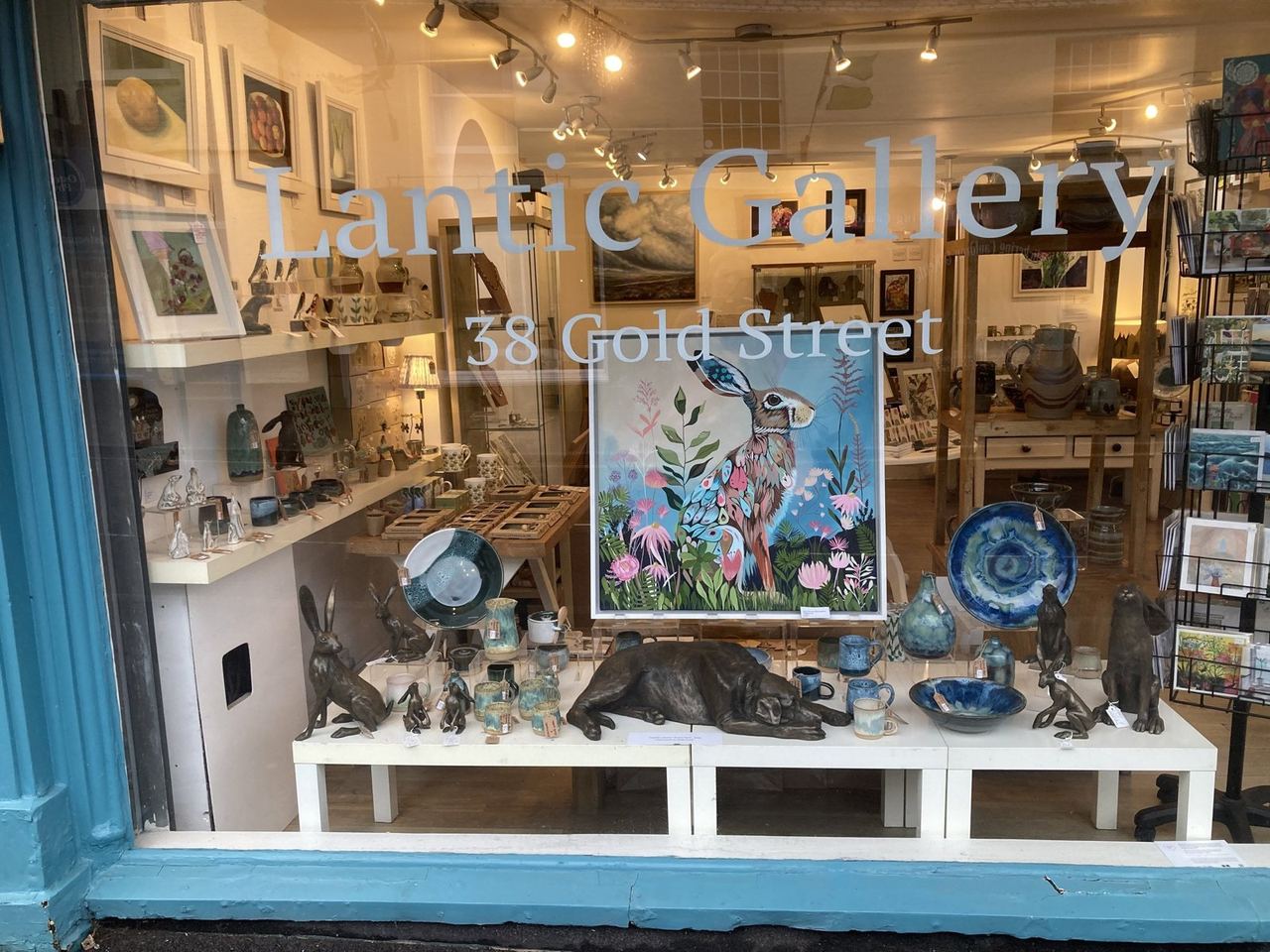 Lantic Gallery window displaying ceramics and framed art