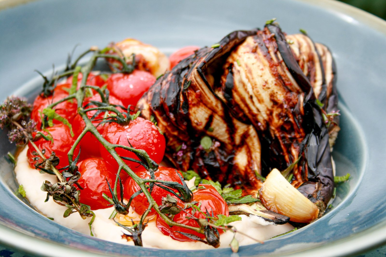 Seasonal vegetables, tomatoes and charred aubergine at The Lost Kitchen