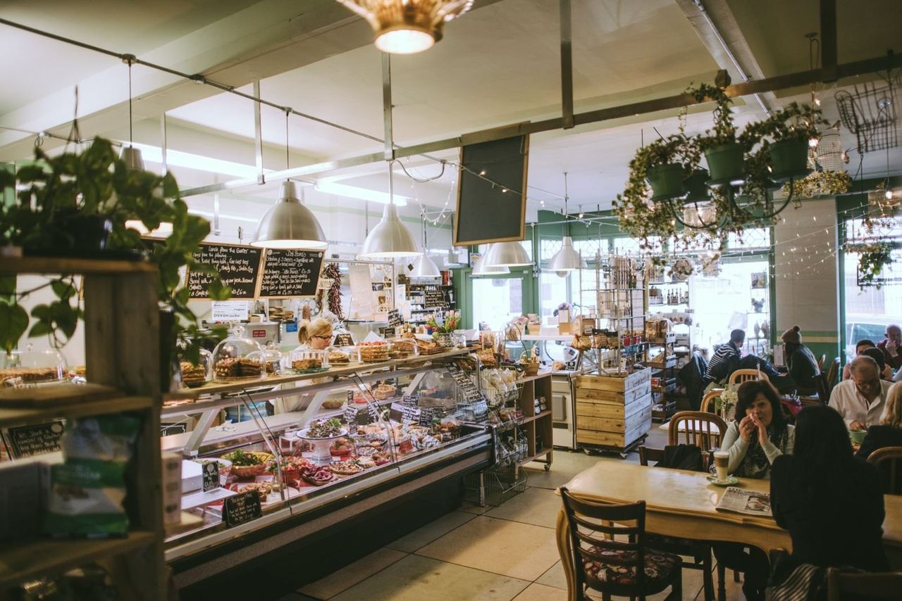 Plant-filled deli interior at Me and Mrs Jones