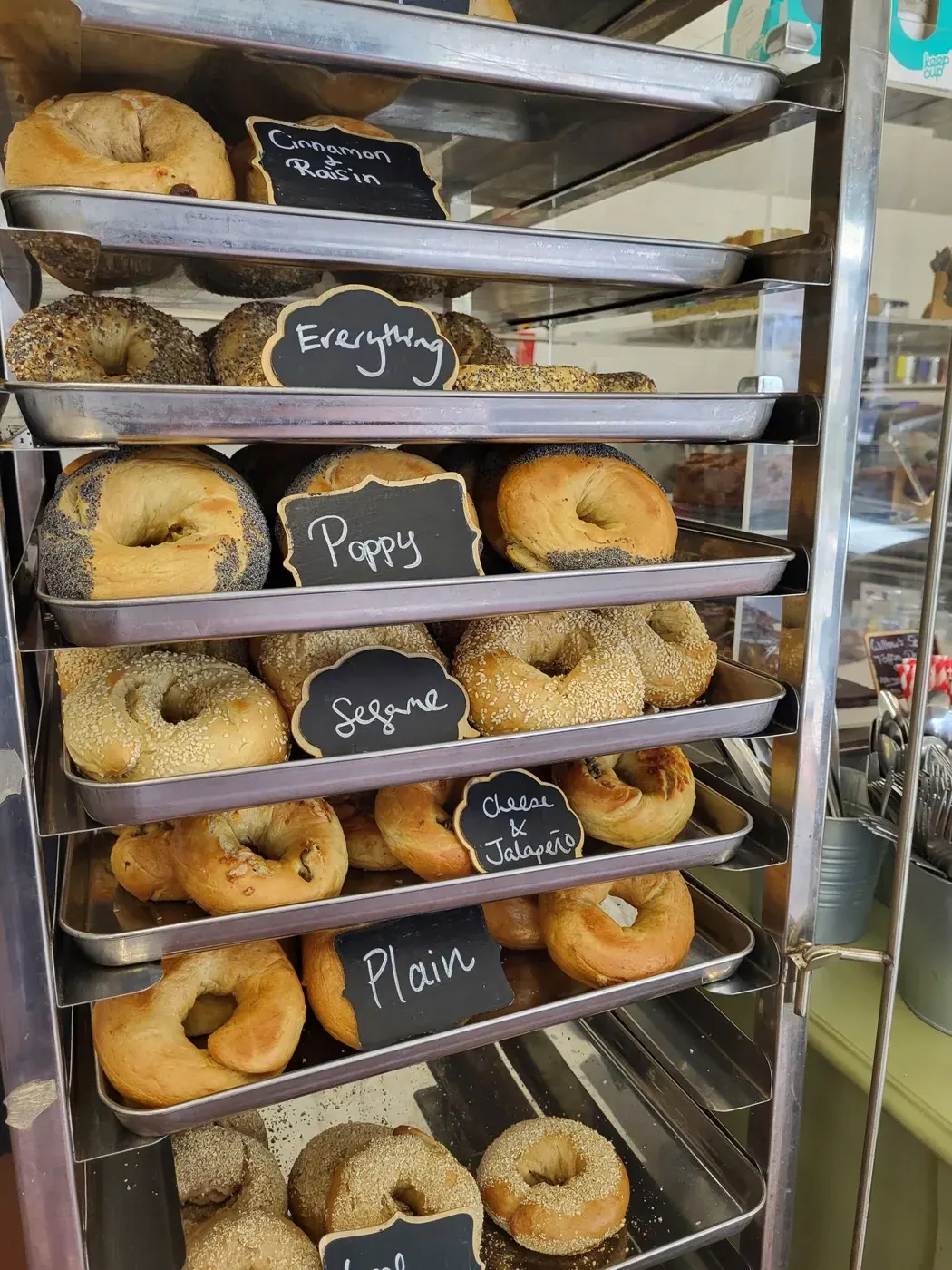 Trays of freshly baked bagels at Montreal Style Bagels