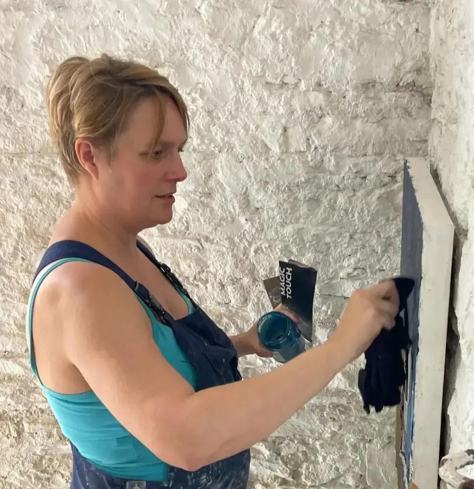 Mooch founder Pam Neaves working on a piece of art