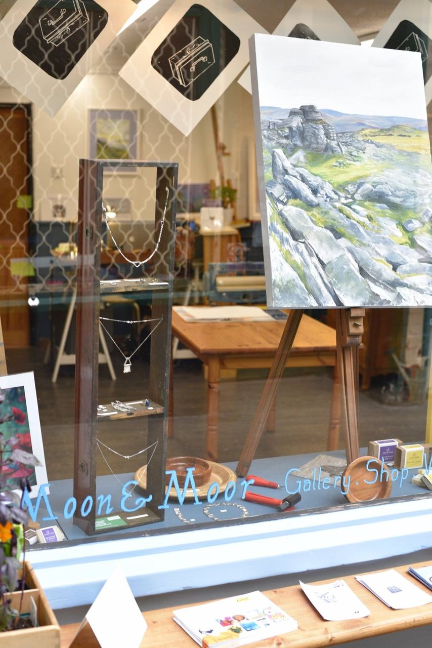 Paintings and objects in the Moon & Moor shop window