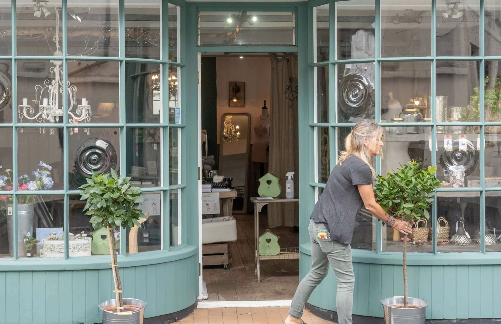 Turquoise Nest shopfront with baskets and plants at the entrance