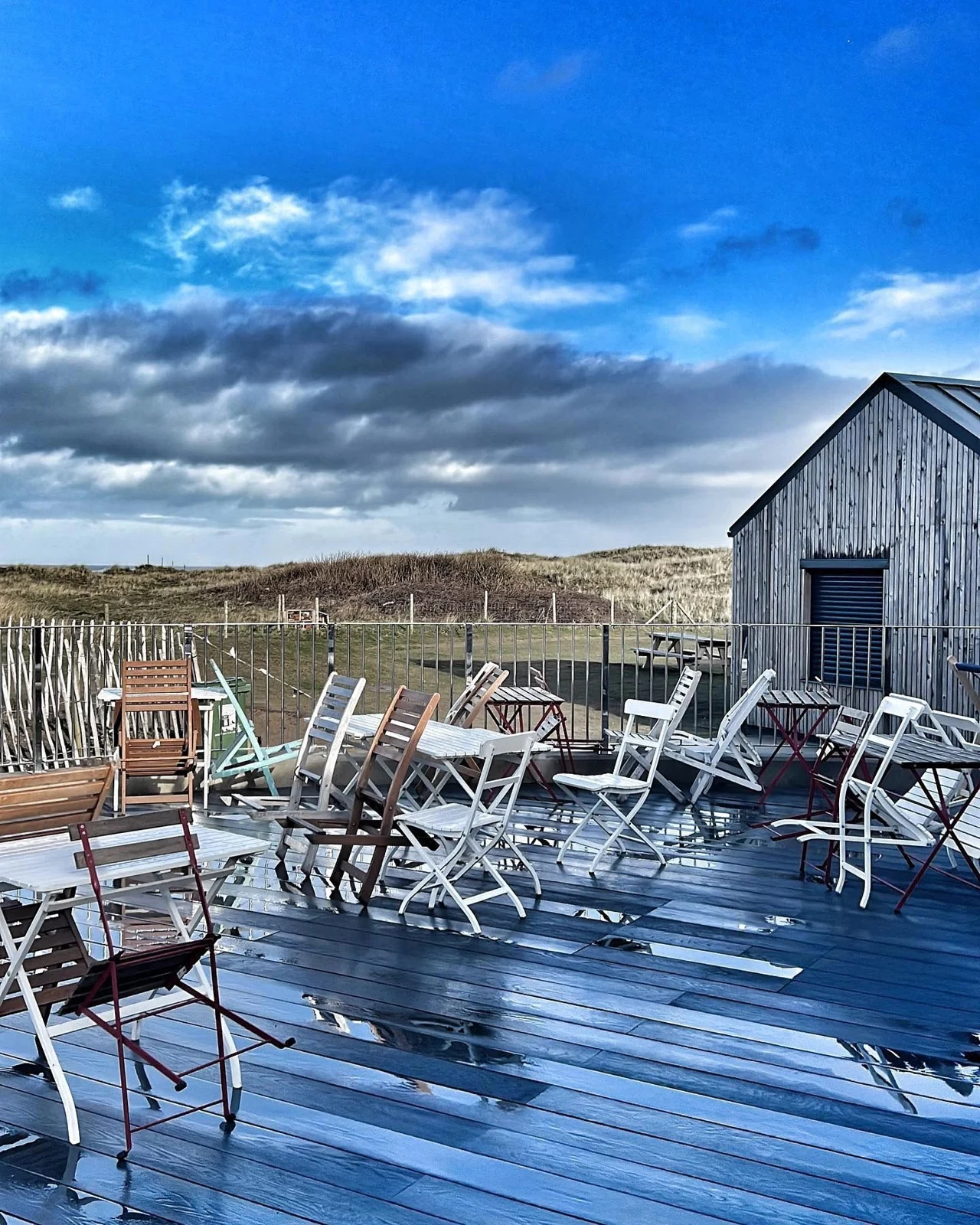 Outdoor tables on the terrace at Pebble Ridge Kitchen