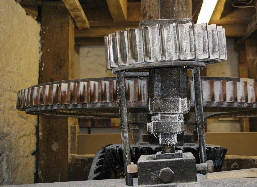 Historic wooden milling machinery at Otterton Mill