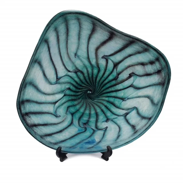 Blue-green glass platter with a dark swirling pattern