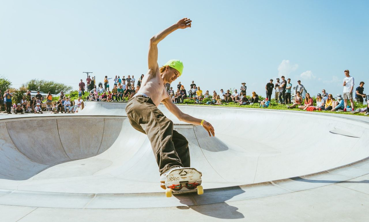 A skateboarder riding the outdoor bowl at Outside Devon