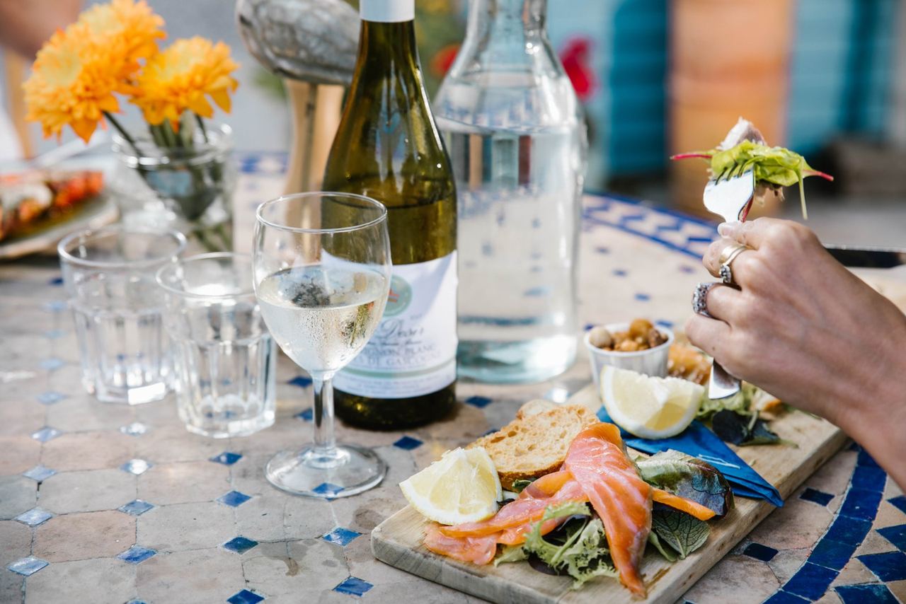 A seafood lunch with wine and flowers at The Oyster Shack