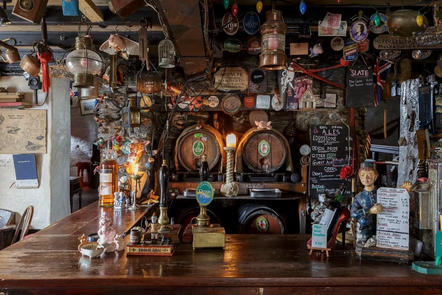 Decorated bar with wooden casks and beer pumps