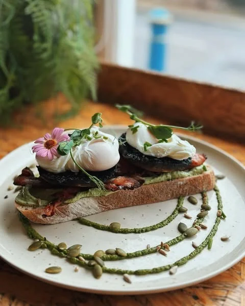 Poached eggs and greens on toast at Port Espresso