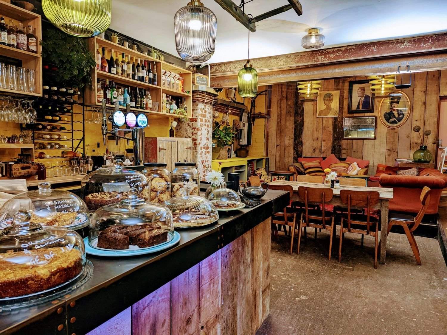 The cake counter and café seating at Rafikis