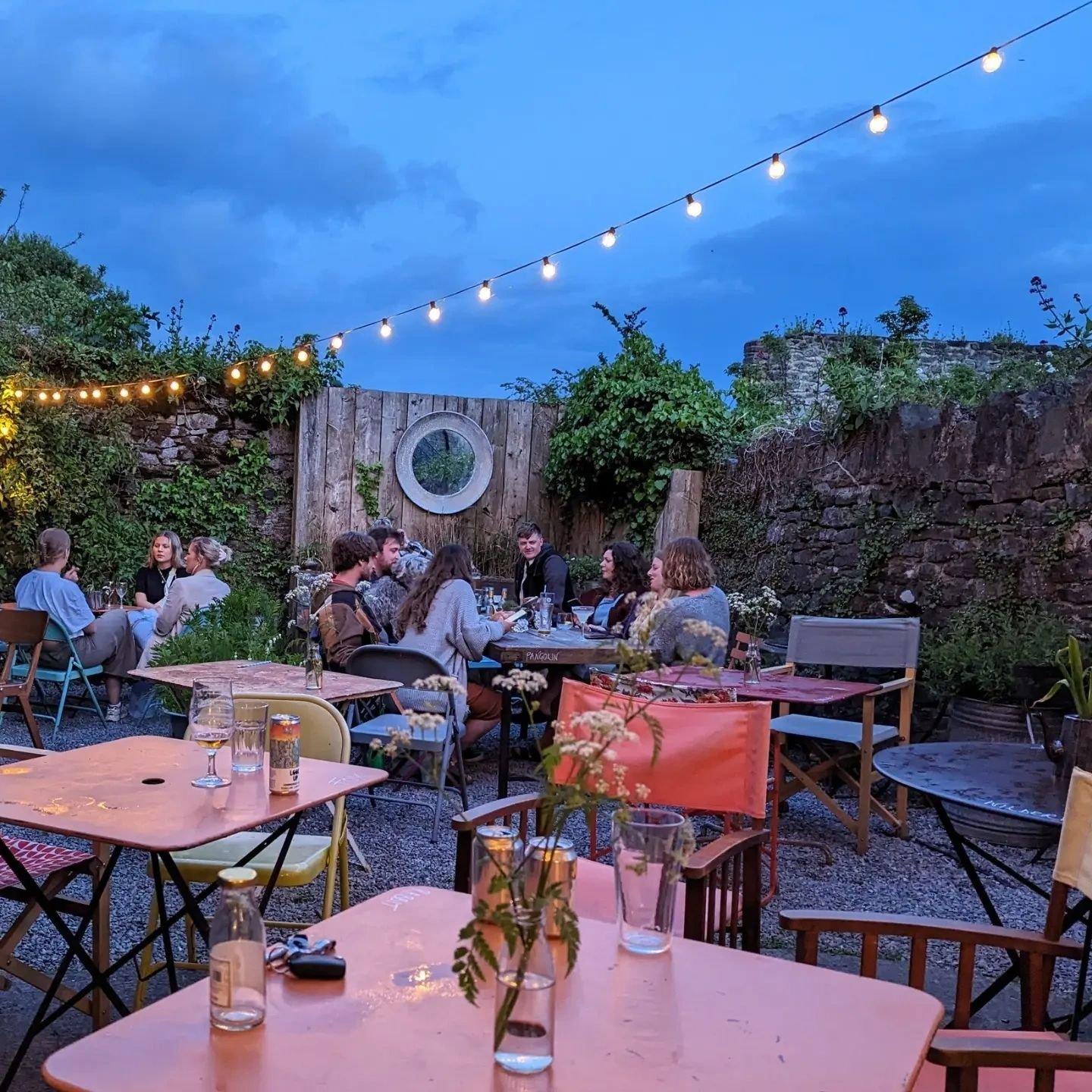 Rafikis courtyard at dusk with festoon lights