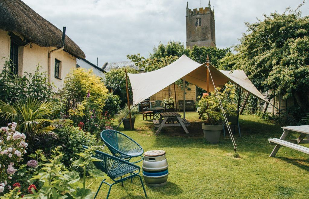 Garden seating and canvas shelter at the Ring of Bells